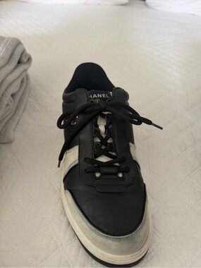 CHANEL Black and White Leather Lace-Up Sneaker